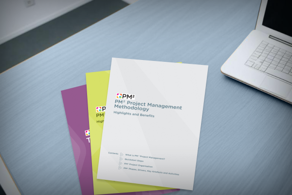 A pile of leaflets with the PM² Project Management Leaflet on top
